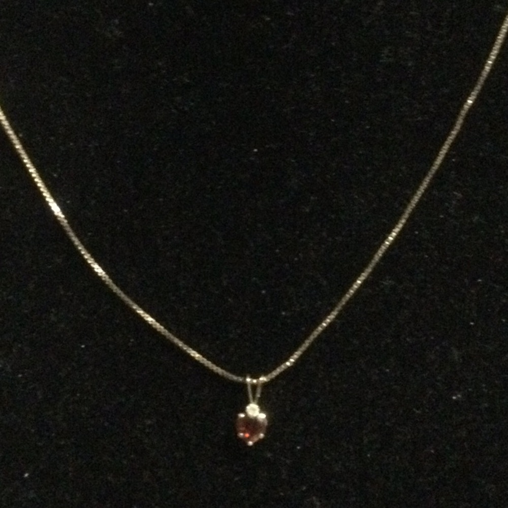 Elegant Gold Necklace with Red Pendant